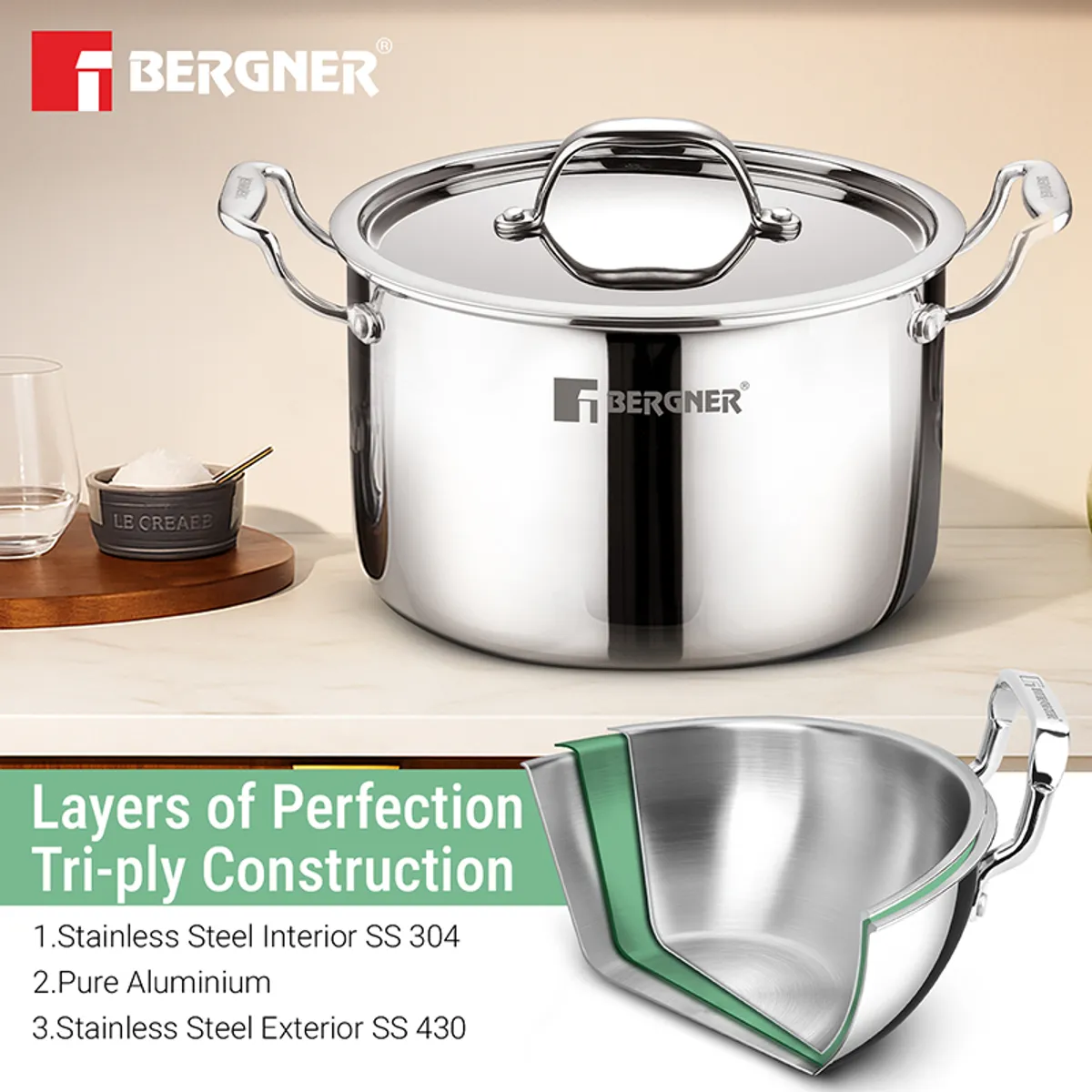 Silver triply cooking pot with lid and cutaway construction graphic