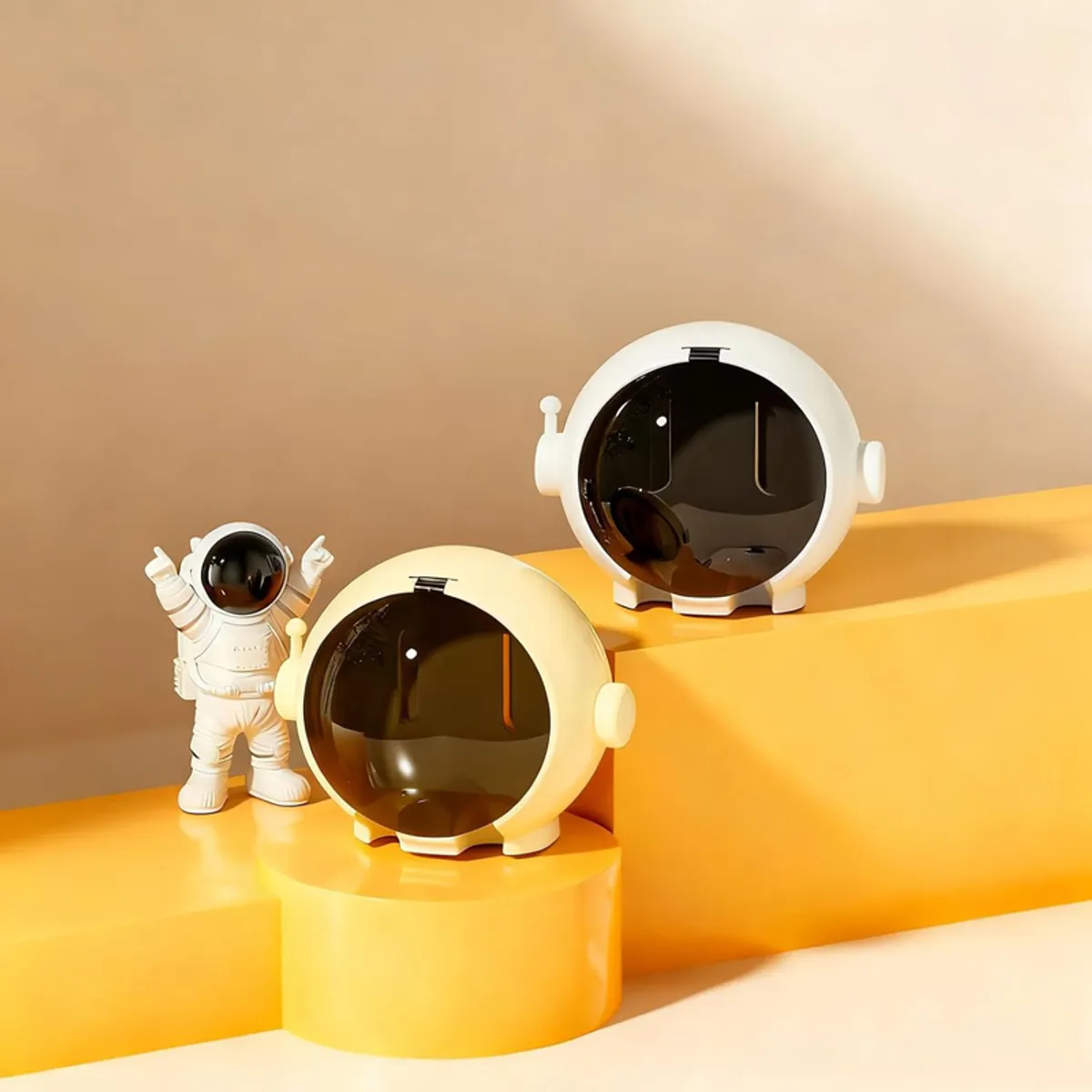 White and black round holders displayed on colourful plinths
