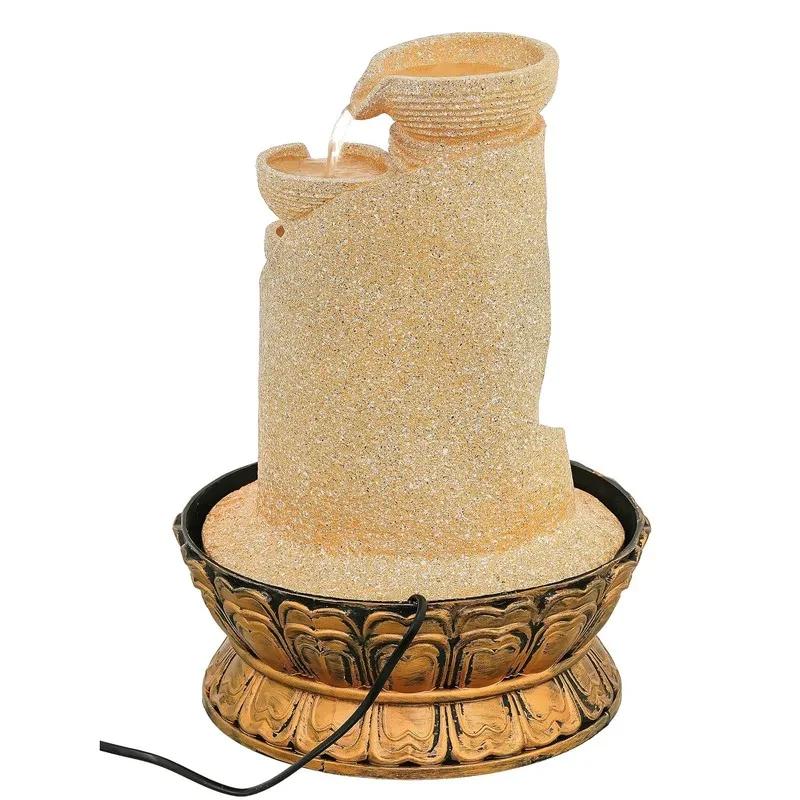 Rear view of ivory tabletop fountain showing power cord and bronze-toned basin