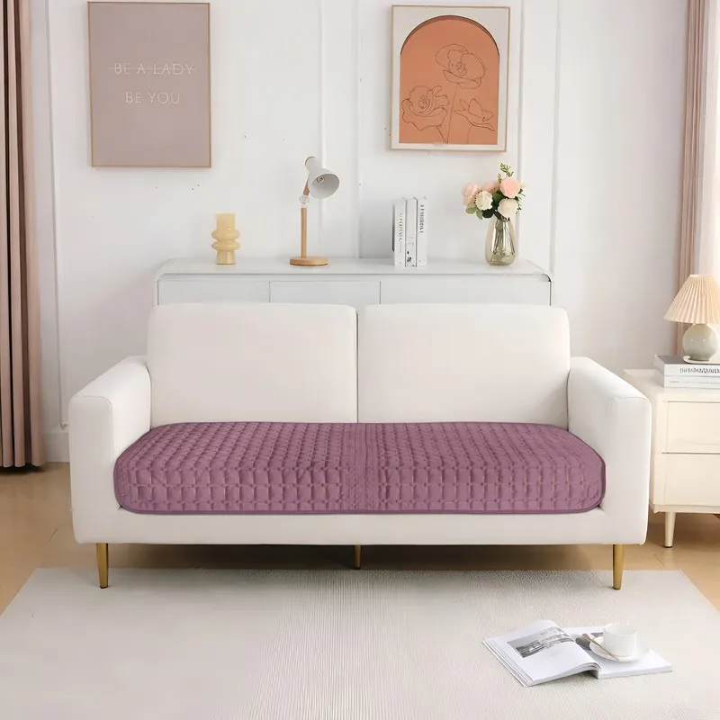 Wine-purple geometric velvet cover arranged across a 2-seater sofa