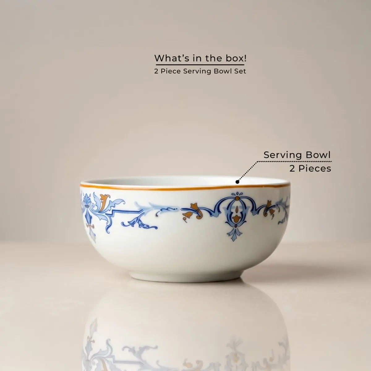 Single white serving bowl with blue ornamental pattern on a plain background