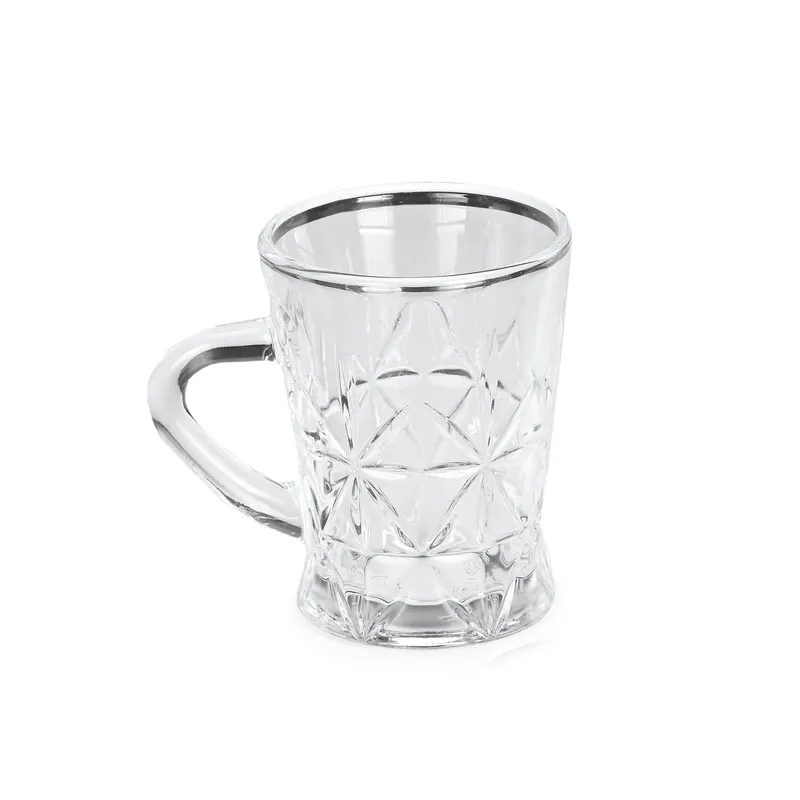 Single transparent glass tea cup with a geometric textured surface