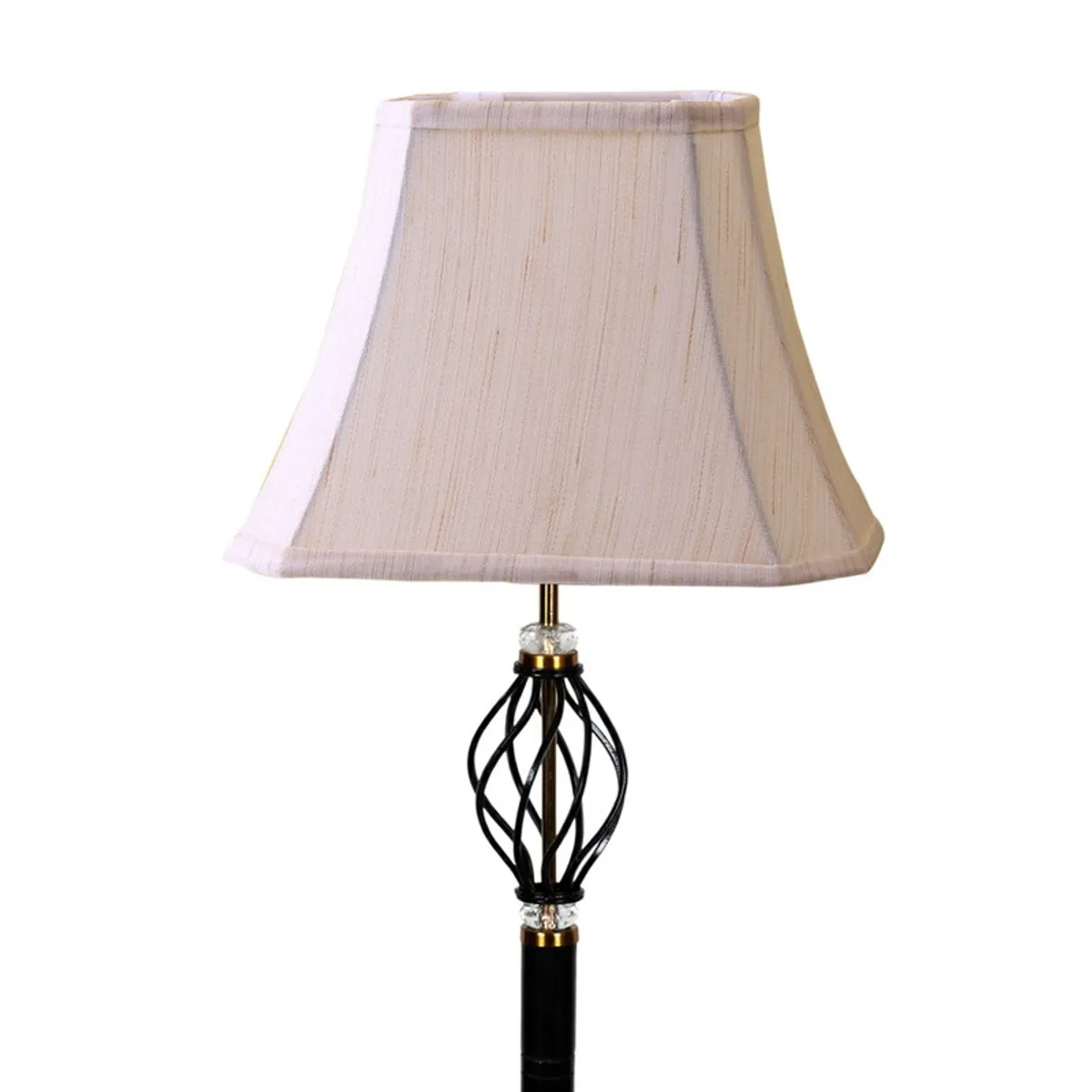 Close-up of pleated beige lampshade and decorative basket-style stem detail