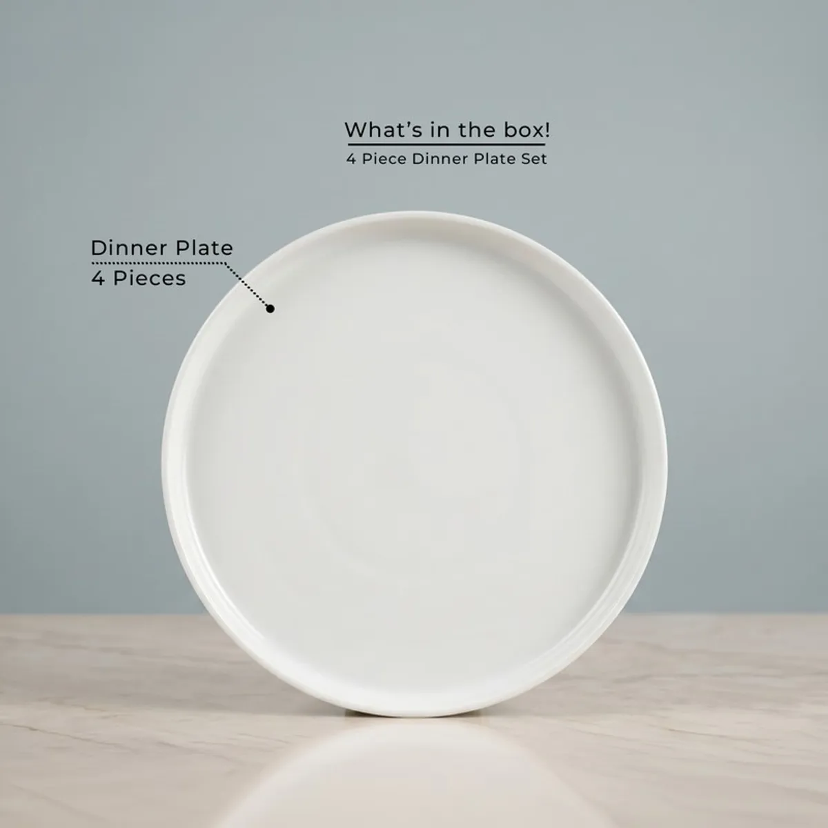 Single white round dinner plate shown front-facing against a pale background