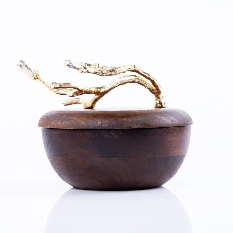 Closed brown accent bowl with a sculptural branch-like top ornament