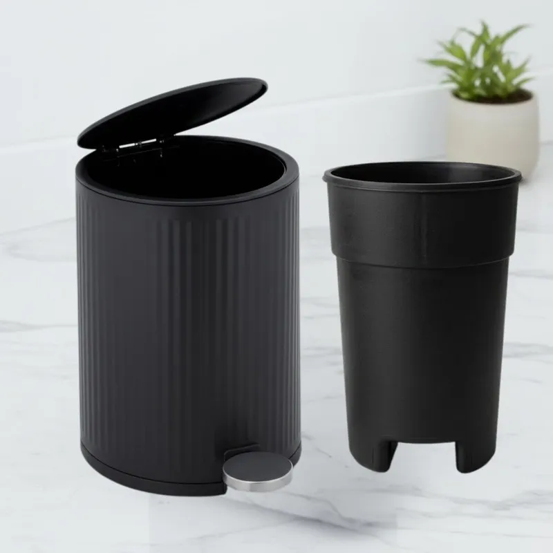 Black dustbin with removable inner bucket shown beside it