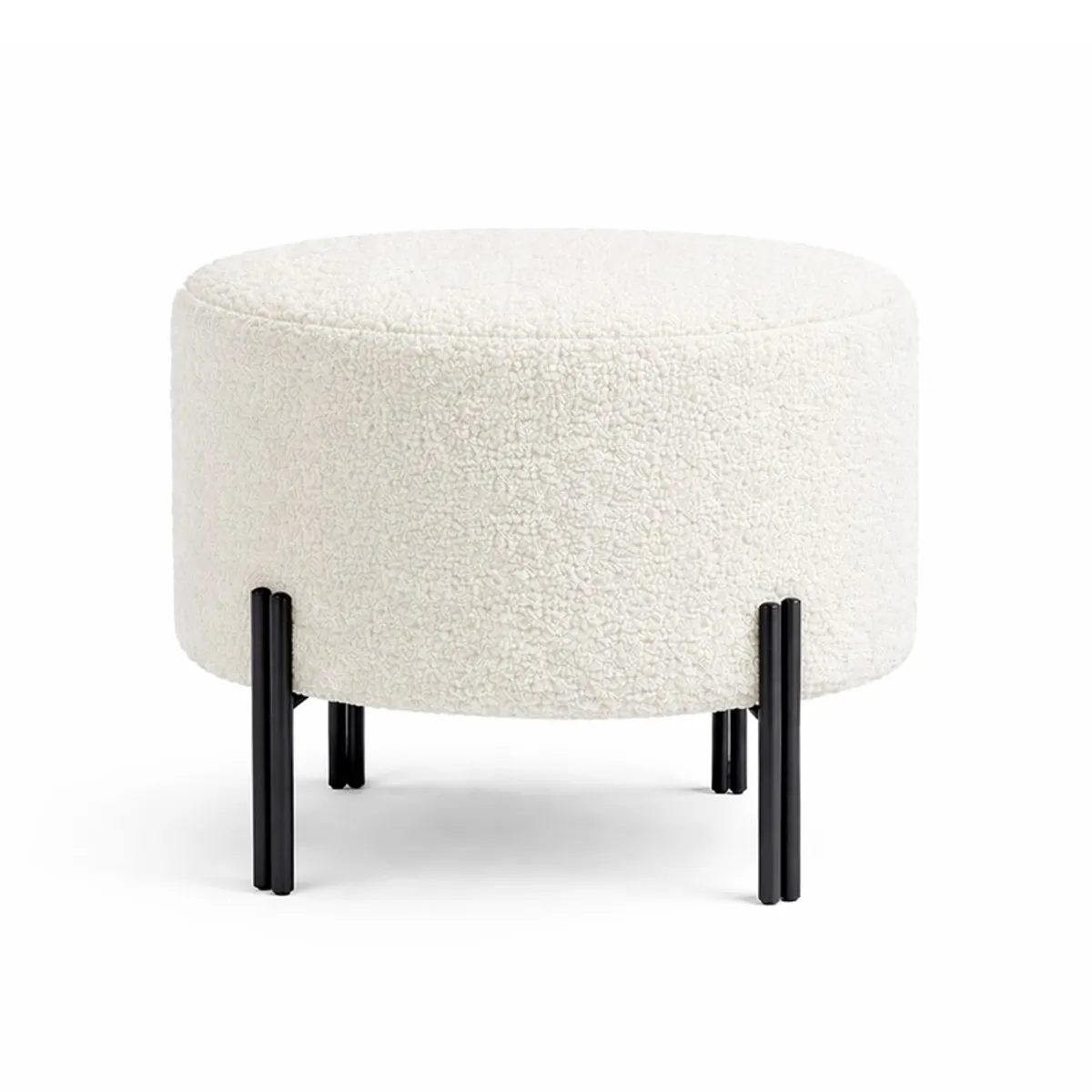 Off-white round bouclé ottoman with four black legs on a white background