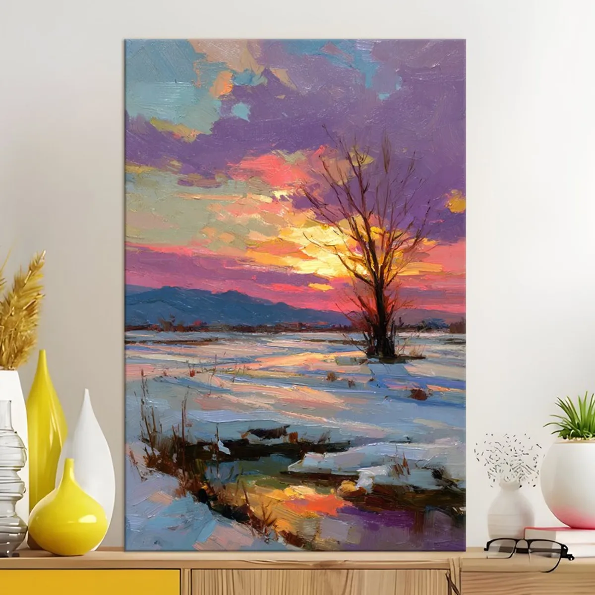 Large winter landscape canvas painting displayed above a console table