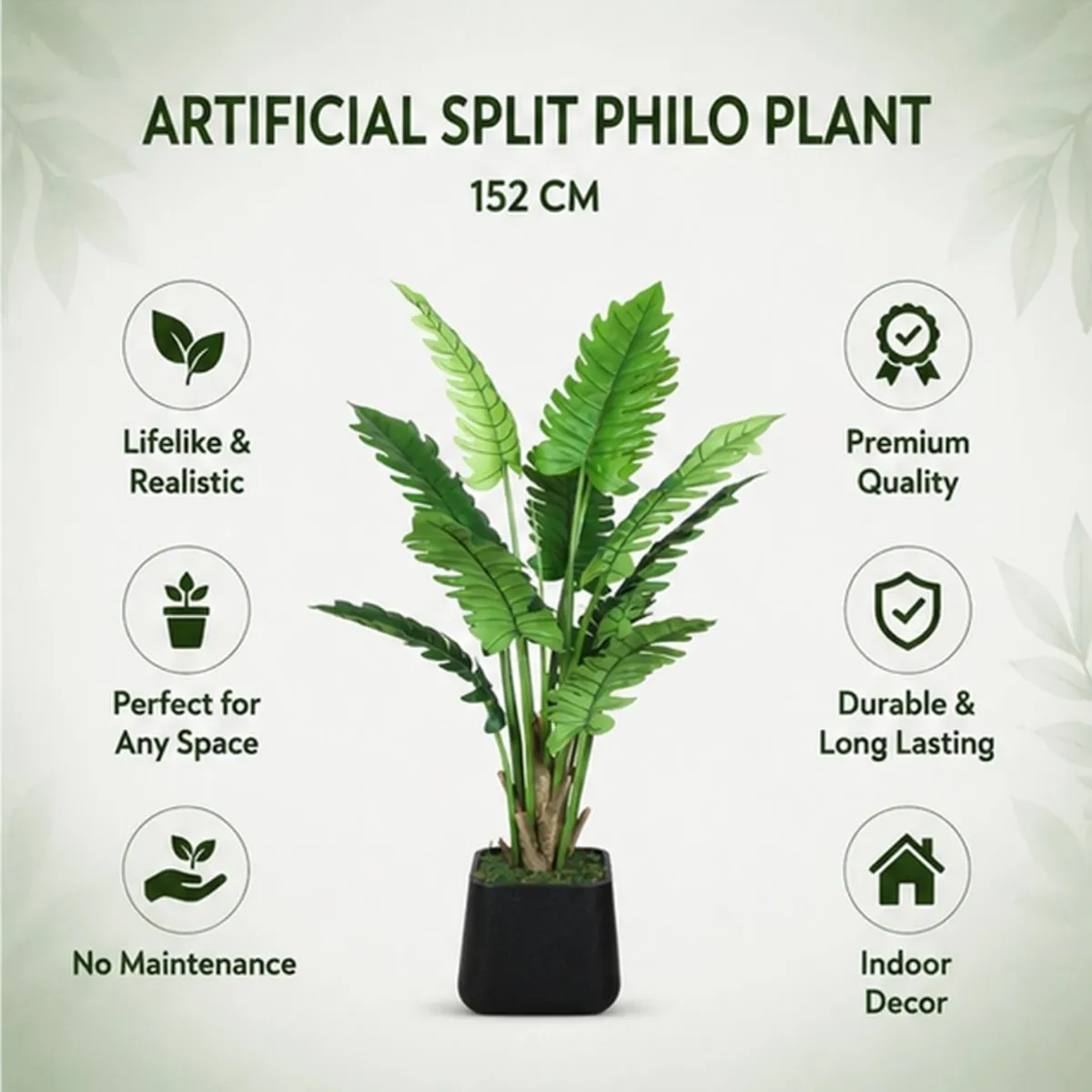 Artificial Philodendron plant shown upright with large green leaves on a white background.