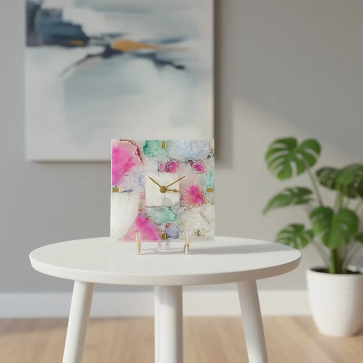 Square agate table clock with pastel marbled finish displayed on a round side table