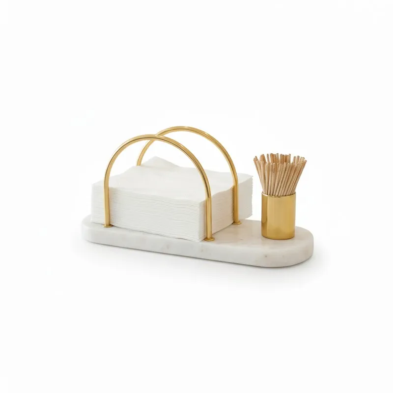 White marble tissue holder with gold arches on a plain white background