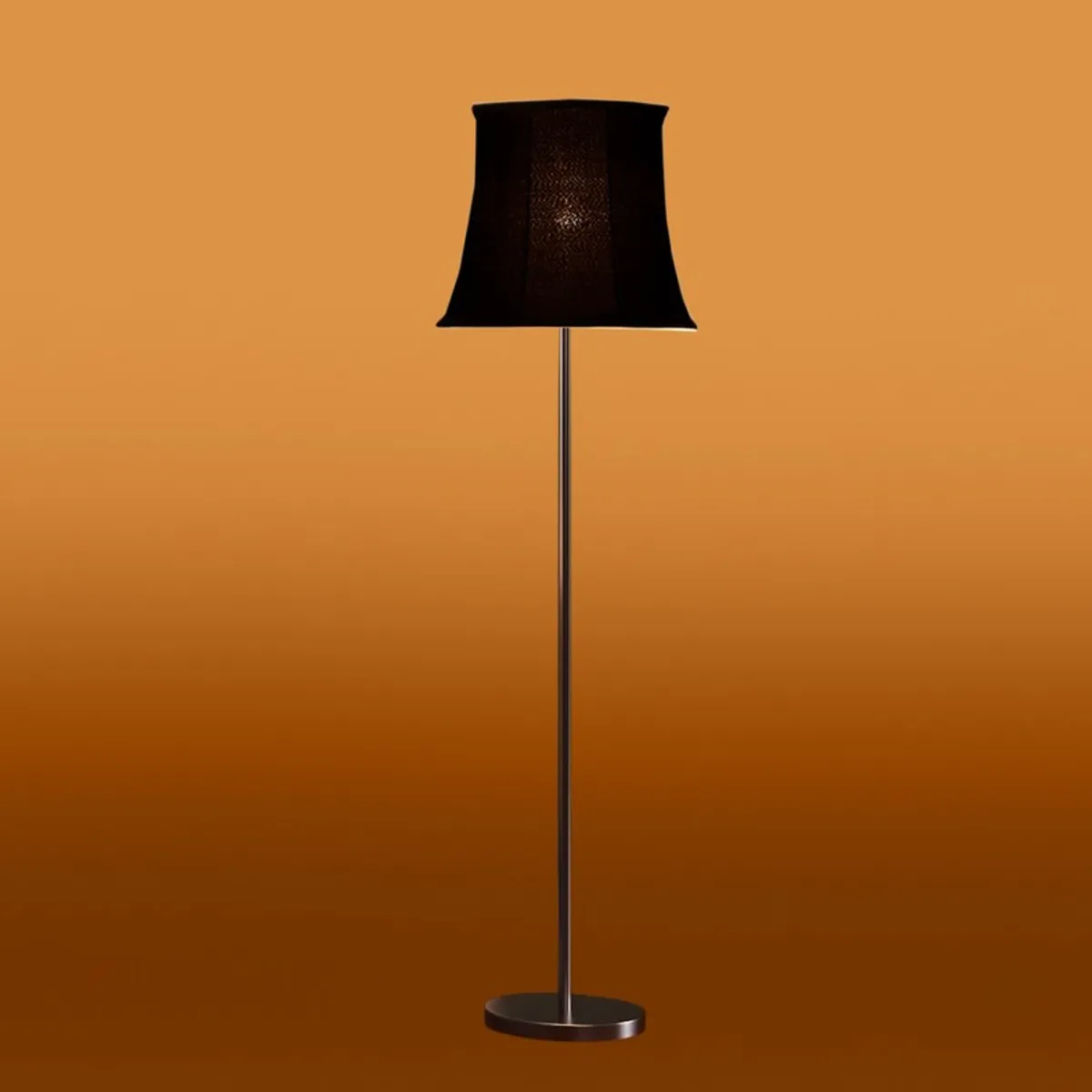 Black floor lamp with lit shade against an orange gradient background