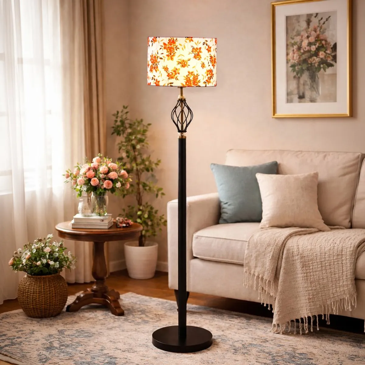 Floral floor lamp styled beside a sofa with flowers and soft curtains