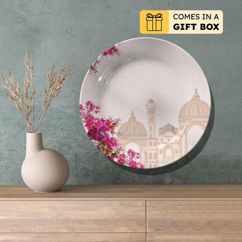 Decorative wall plate displayed above a wooden console with a vase nearby