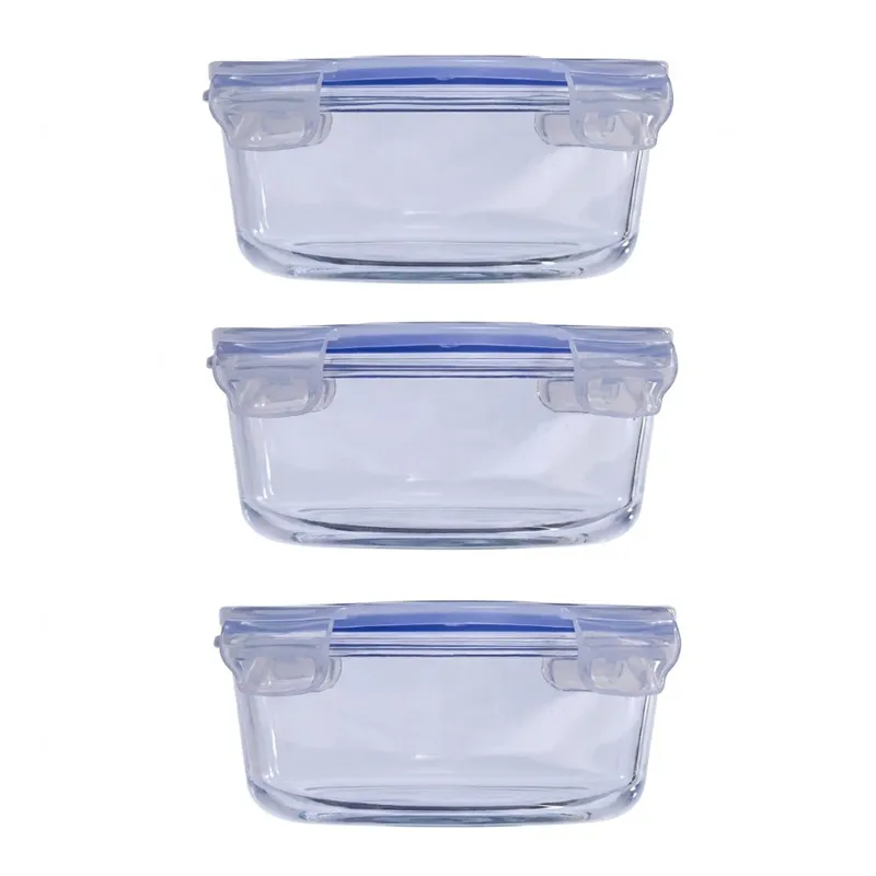 Set of three transparent glass containers with blue locking lids