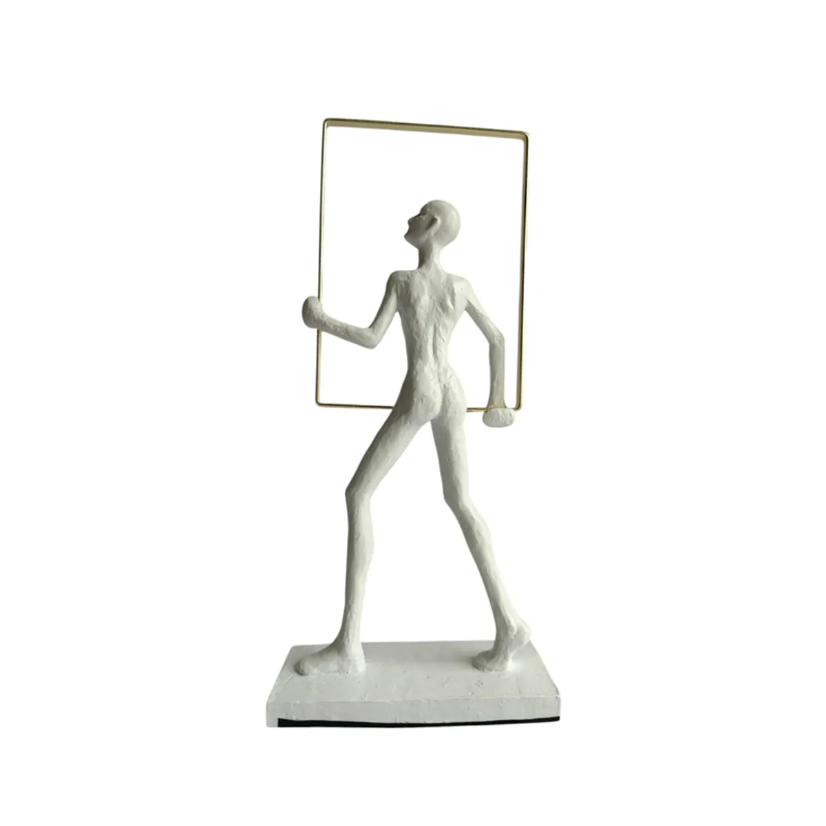 Back view of the white abstract human figurine on its rectangular base