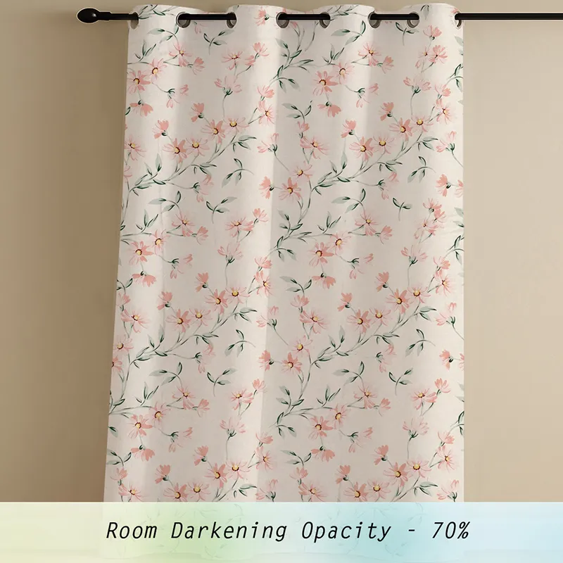Single floral curtain panel hanging from a rod against a plain wall