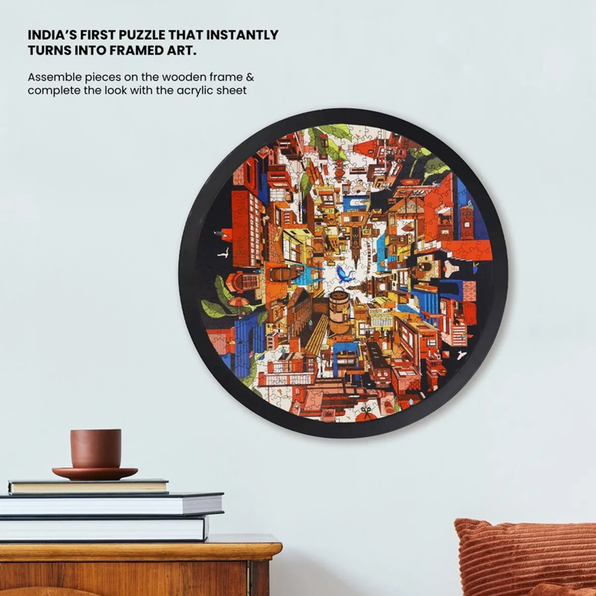 Round framed abstract cityscape puzzle art displayed above a wooden table