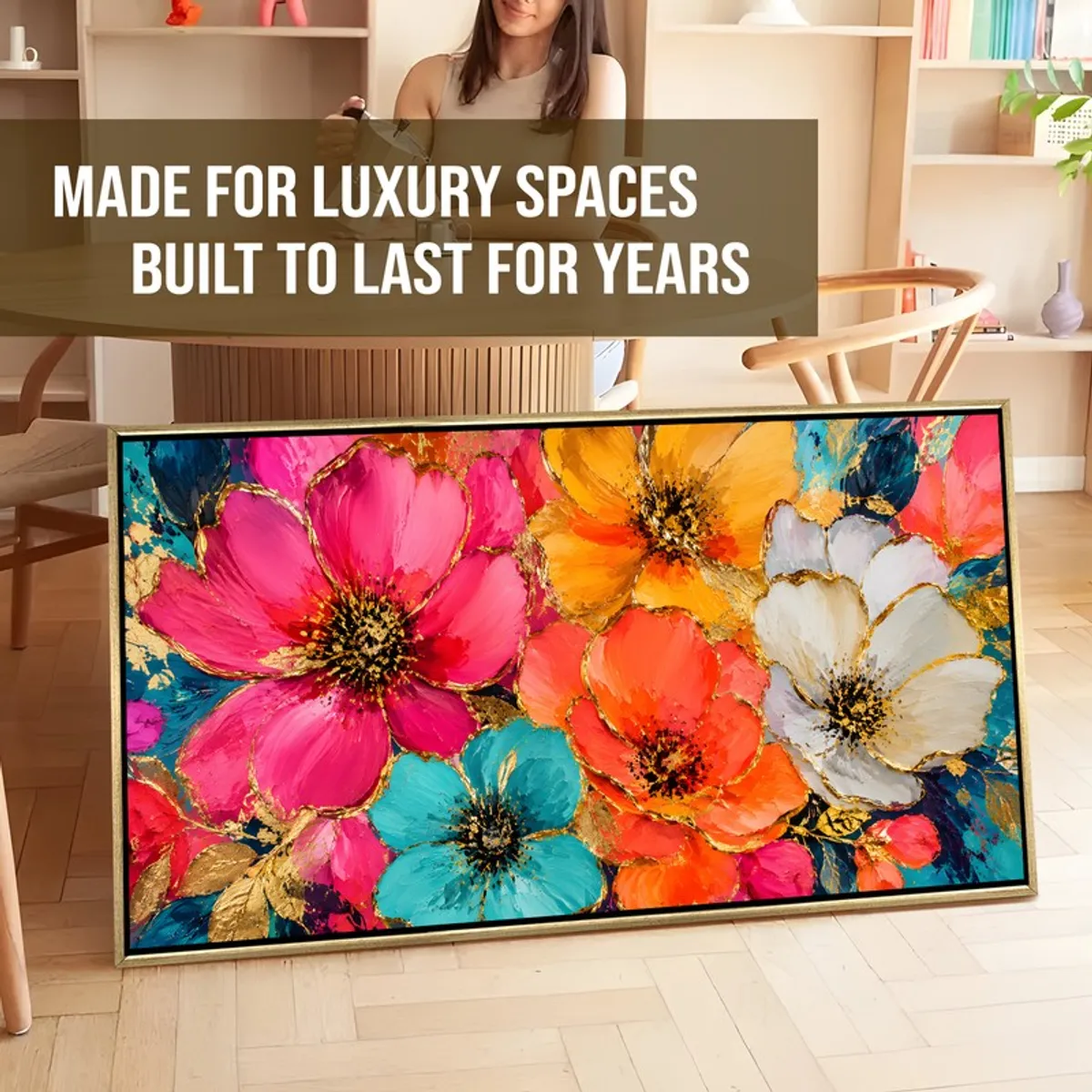 Large framed floral canvas painting with vivid blooms leaning against a wall indoors