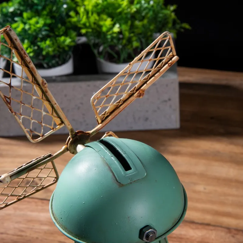 Top view of the blue windmill showpiece showing the coin slot