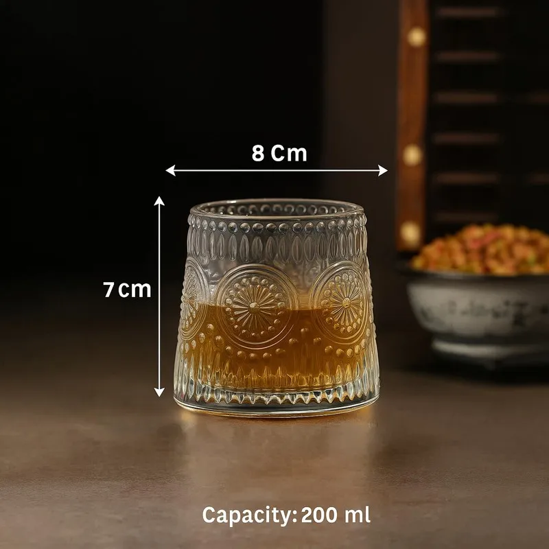 Clear glass whiskey tumbler with capacity text shown in image