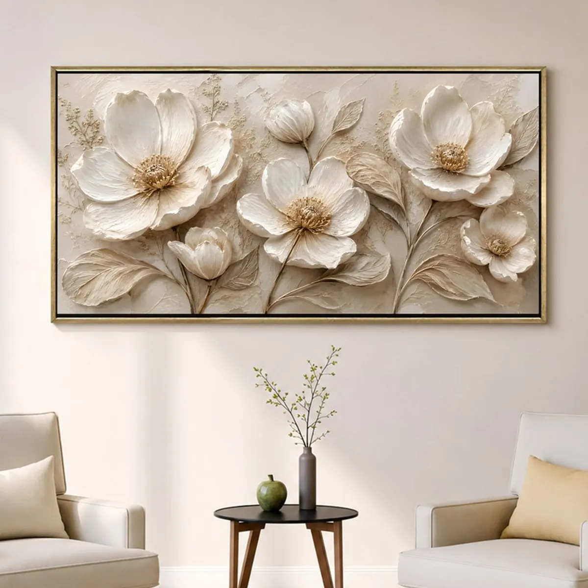 Ivory blossom wall art with gold frame displayed above two armchairs