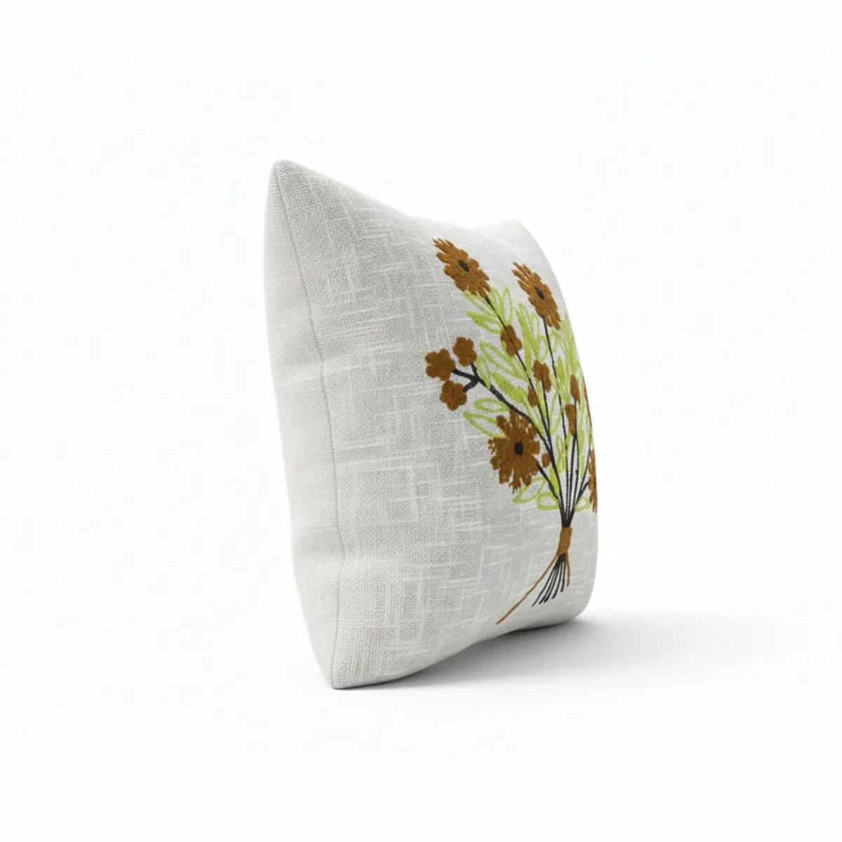 Side view showing the textured cotton-like surface of a floral cushion cover