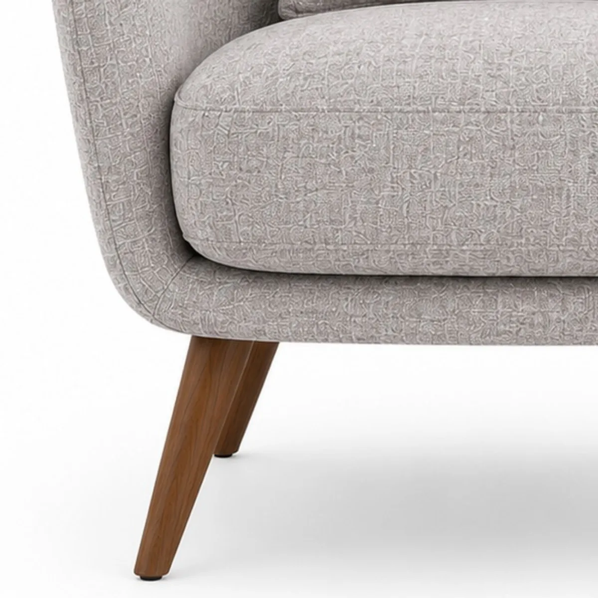 Close-up of grey chair upholstery and a tapered teak wood leg