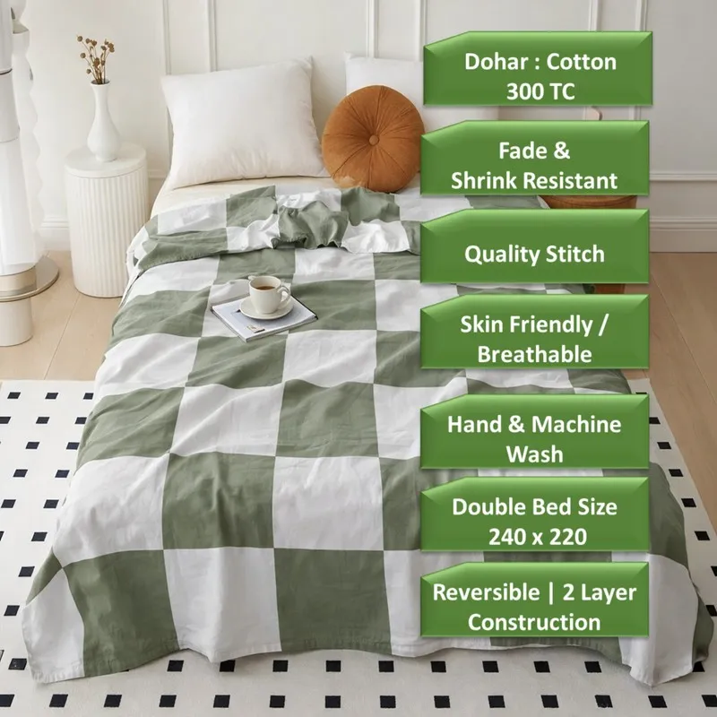 Green and white checked dohar on a bed with promotional text overlay