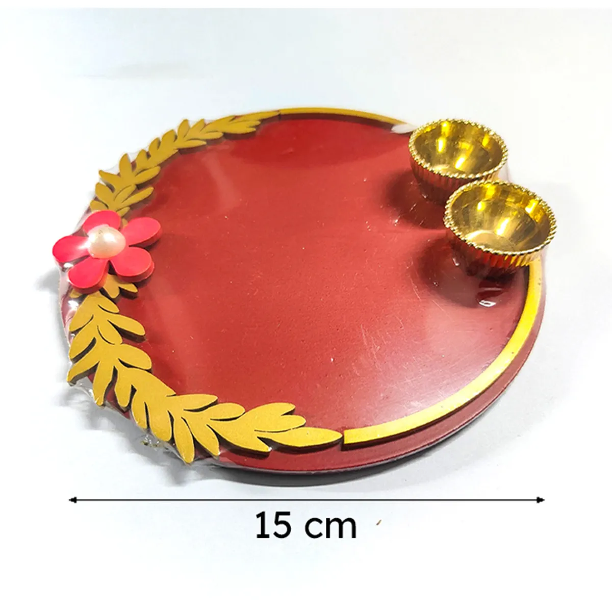 Maroon round pooja thali with gold border and two bowls shown with size marker