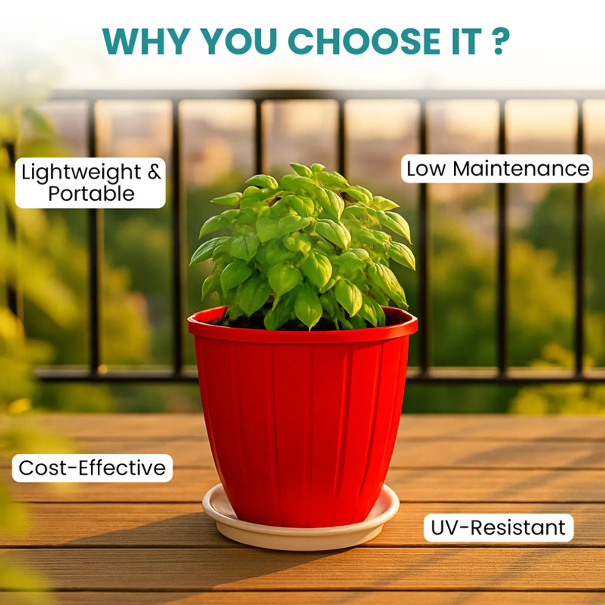 Red planter with a green plant and white tray on a sunlit balcony.