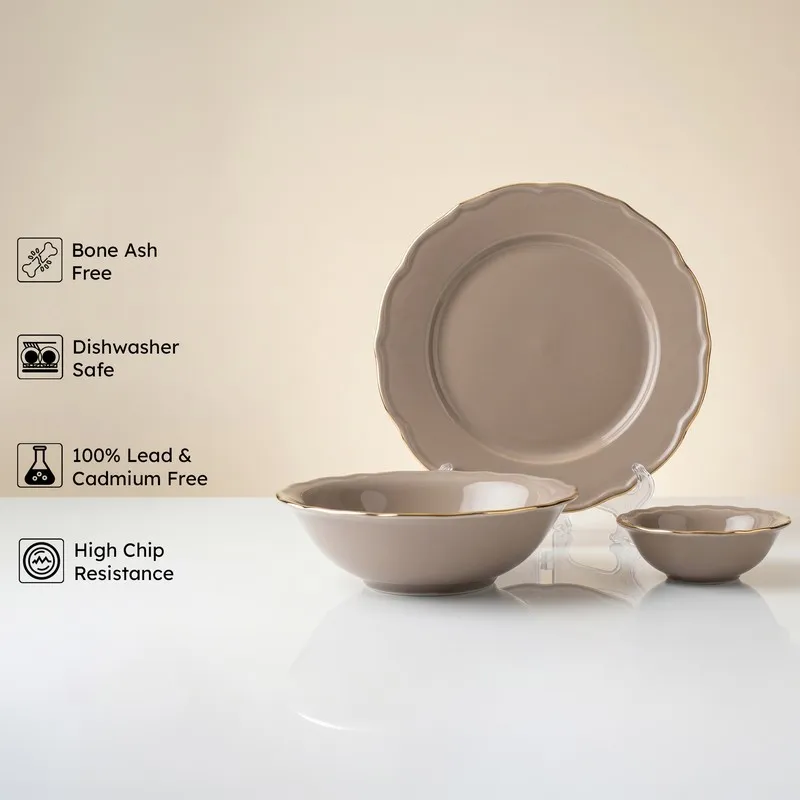 Grey plate and bowls with gold edging from the dinner set