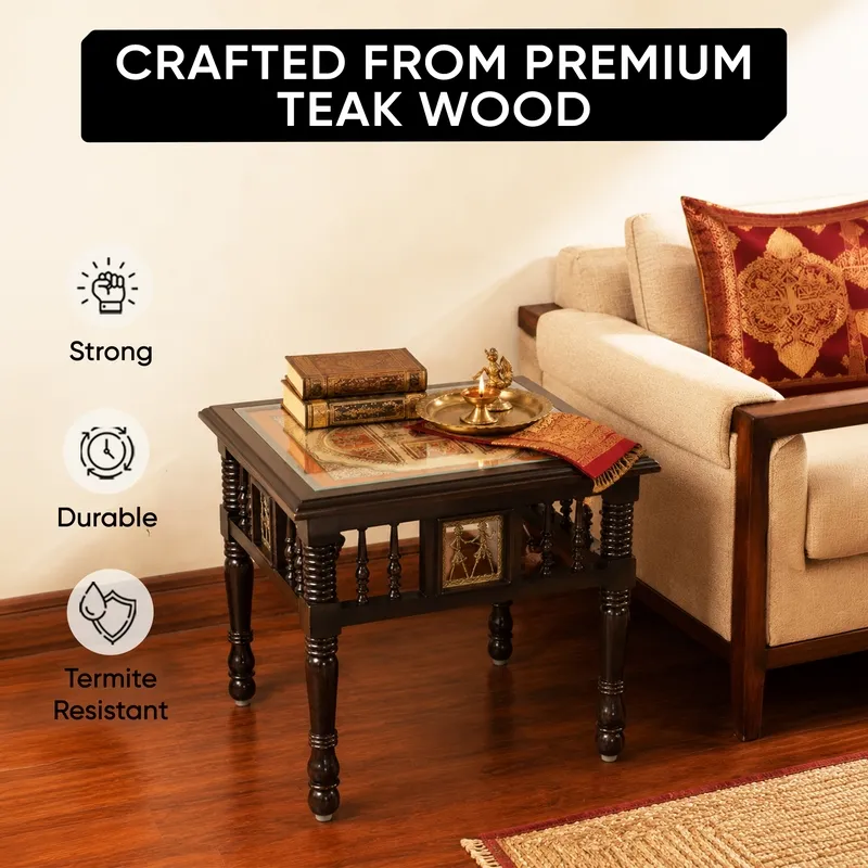 Dark brown square side table styled beside a sofa in a living room