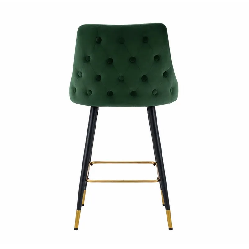 Rear view of a green velvet bar chair with button-tufted backrest