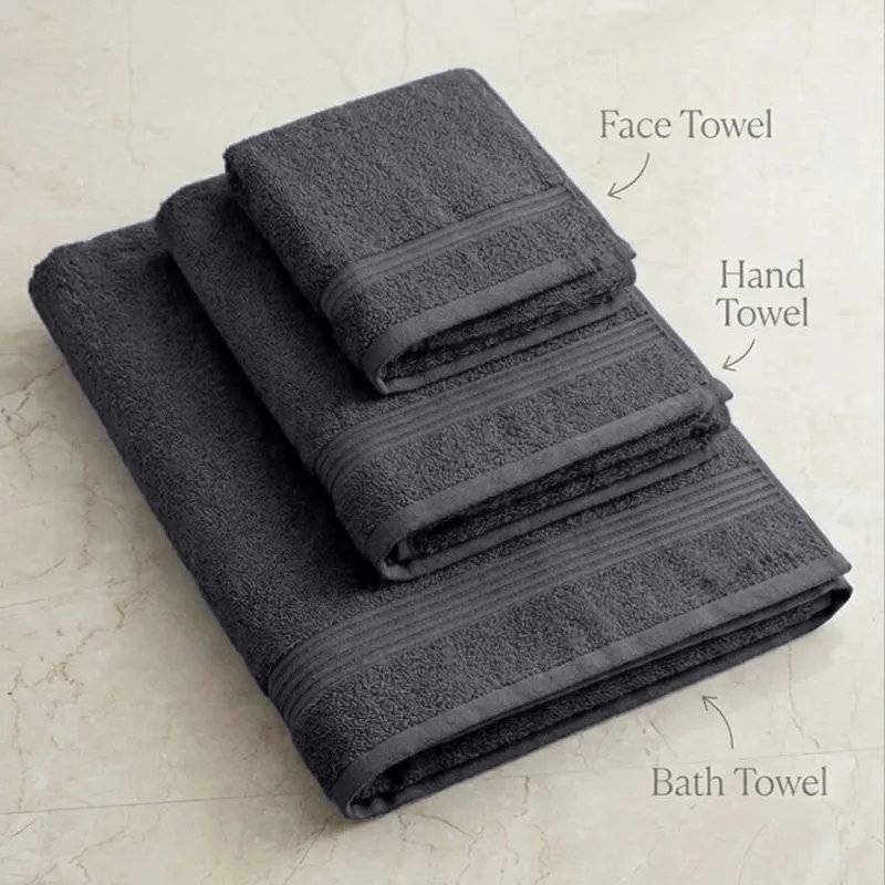 Stacked charcoal grey face, hand and bath towels