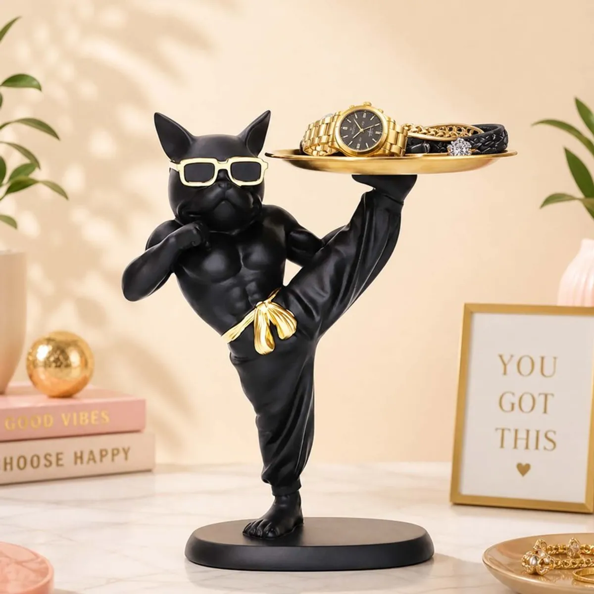 Black bulldog accent tray displayed with a watch and jewellery on a tabletop