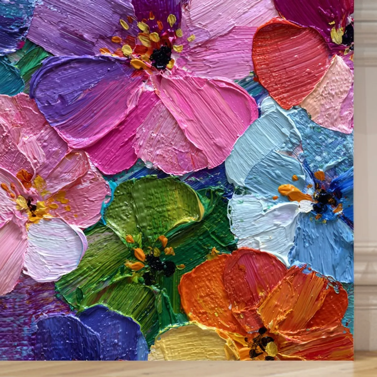 Close-up of colourful textured flower petals on canvas artwork