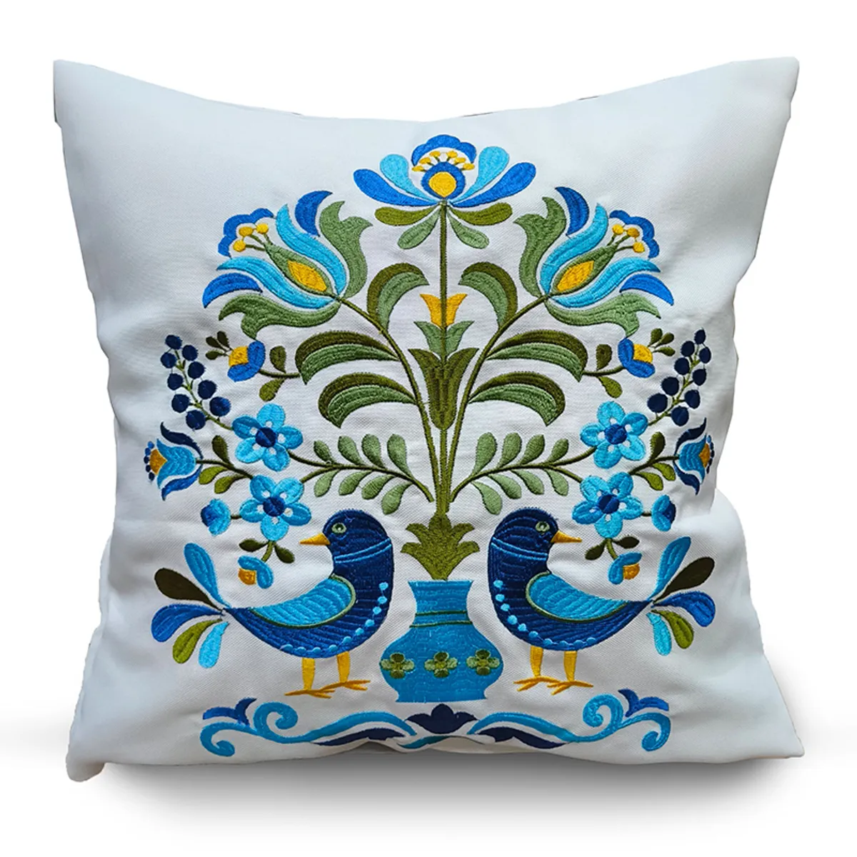 Single off-white cushion cover with symmetrical blue bird and floral embroidery