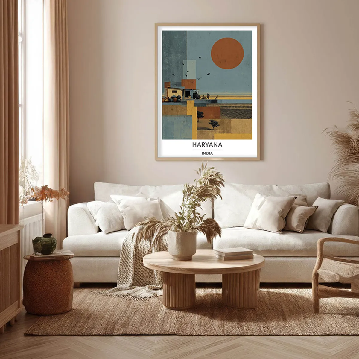 Framed Haryana wall art styled above a cream sofa in a living room