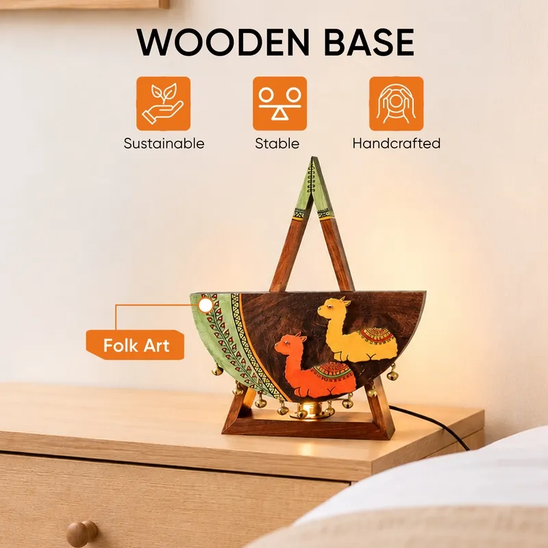Close view of multicolour wooden lamp with alpaca figures and folk-style detailing