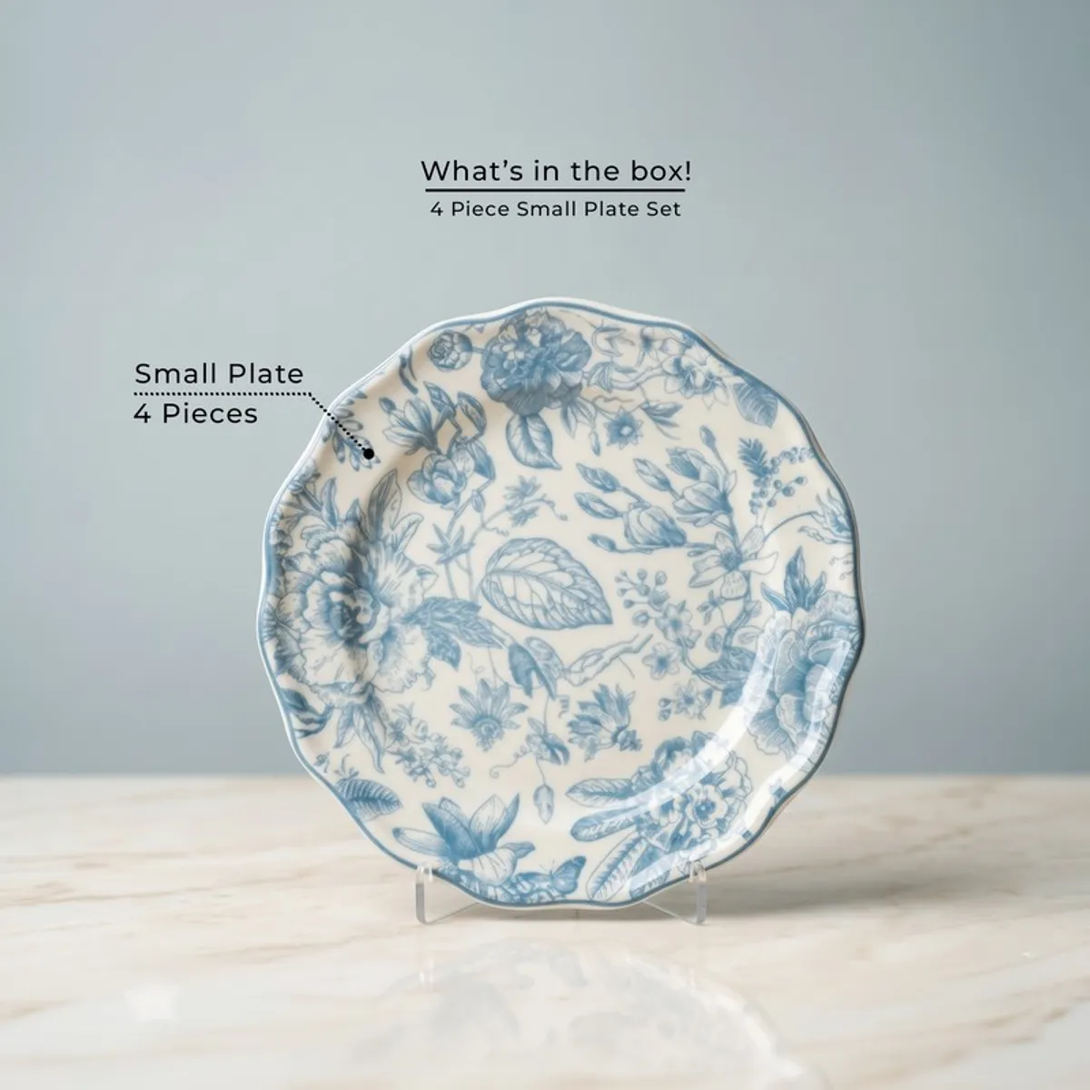 Single blue and white floral quarter plate on a stand