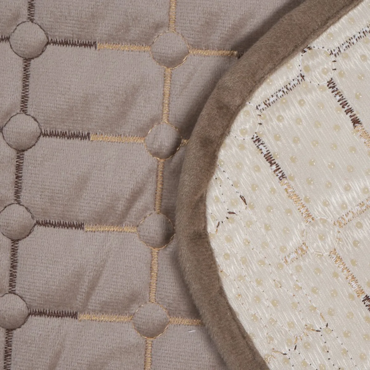 Close-up of the brown cover showing its patterned surface and underside