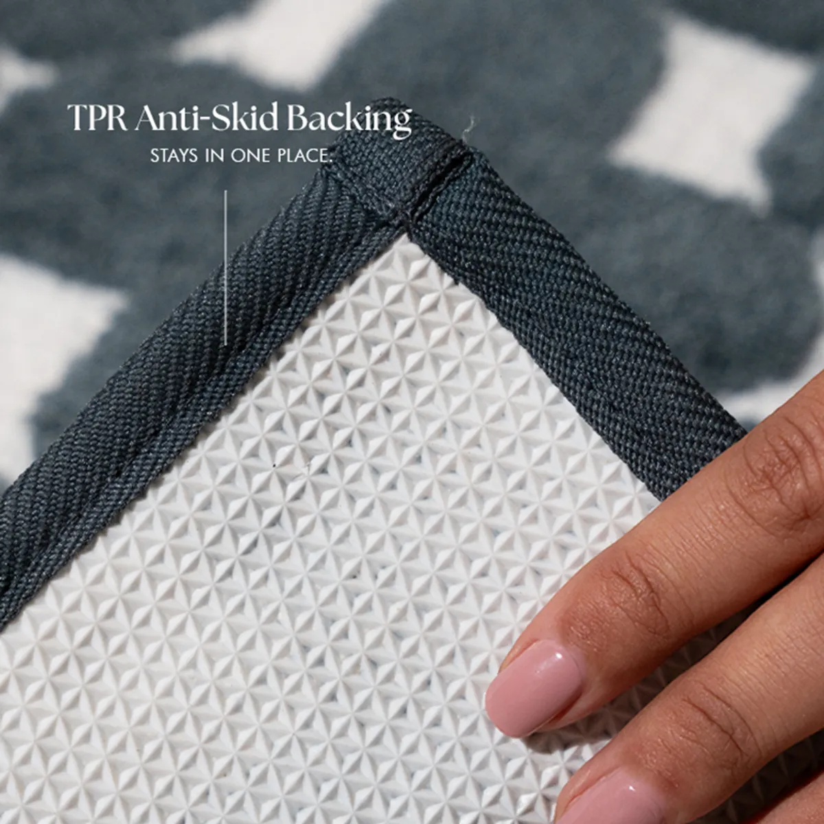 Close-up of the bath mat's textured TPR anti-skid backing