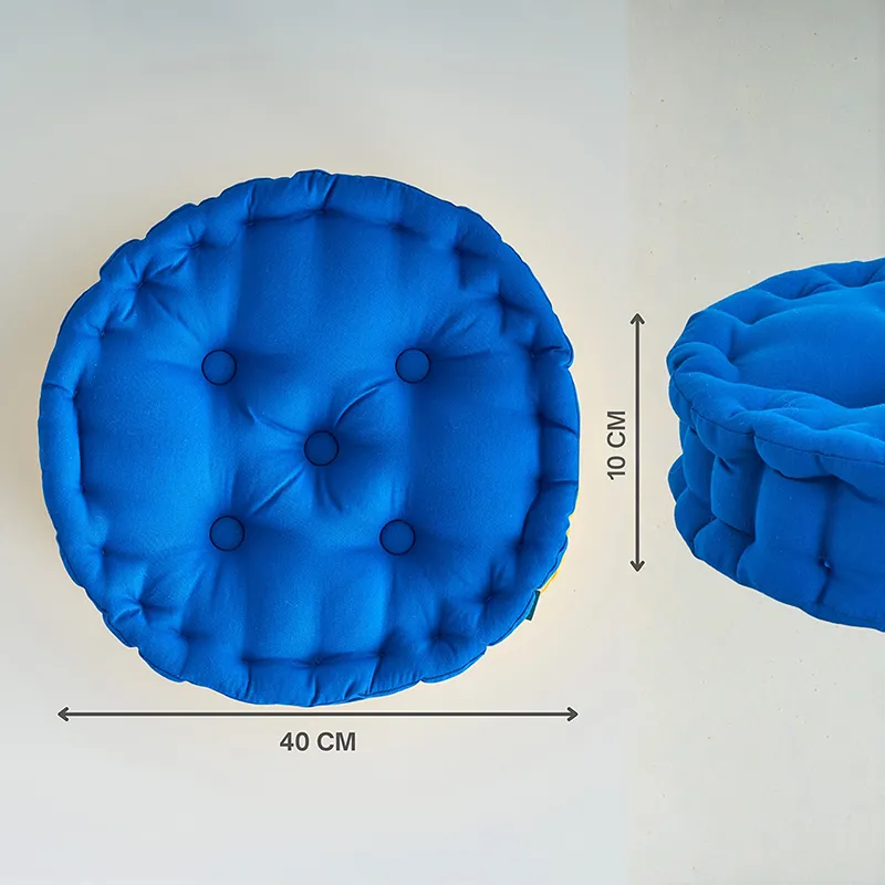 Top and side view of a round classic blue floor cushion