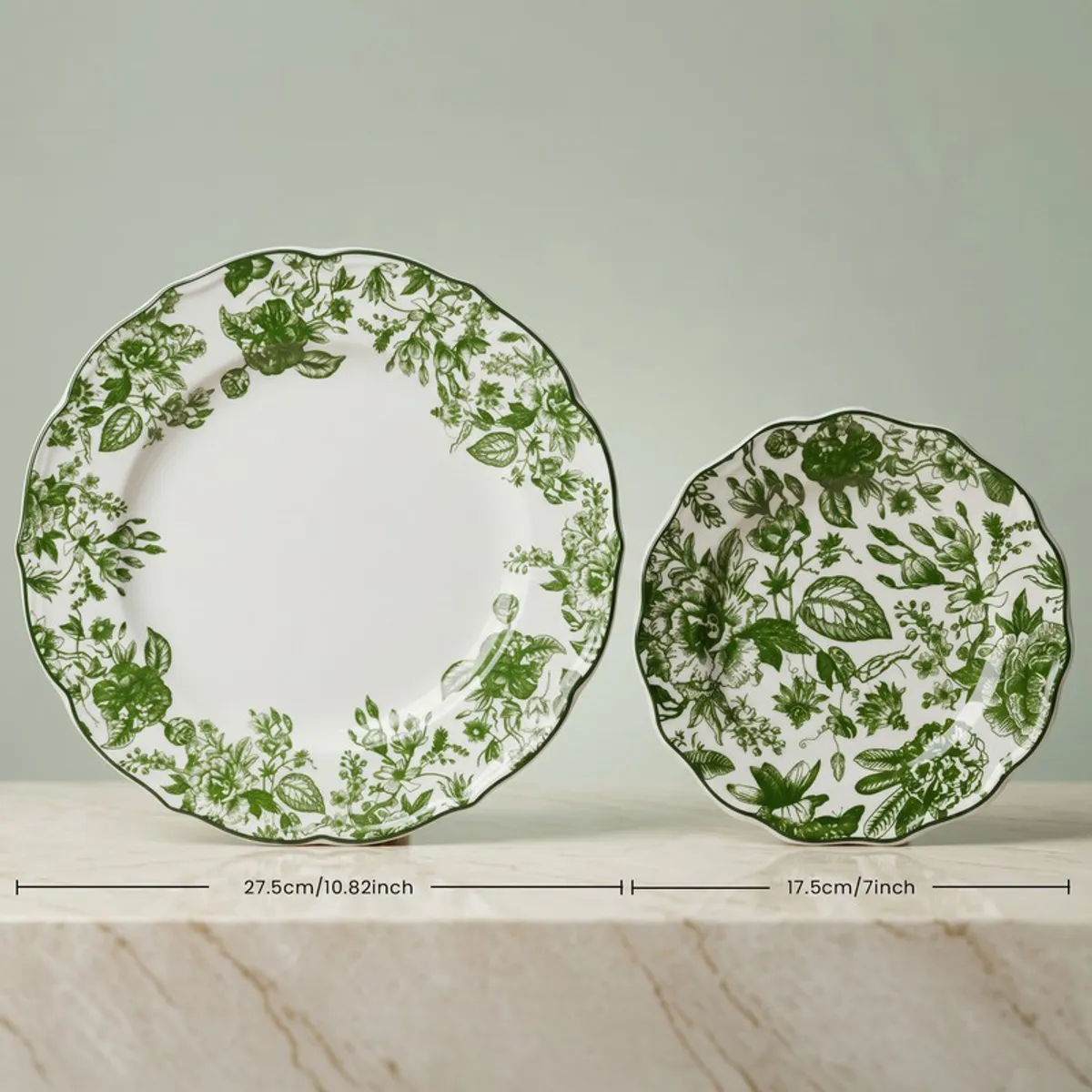 Large and small green floral plates shown side by side
