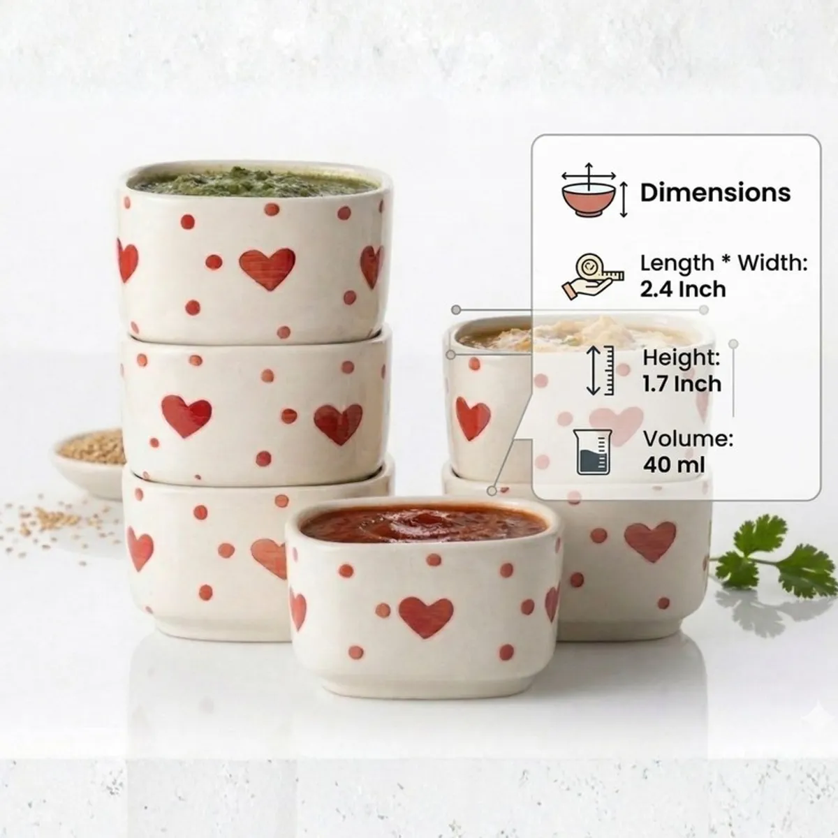 White ceramic dip bowls with red heart motifs and dimension graphic overlay