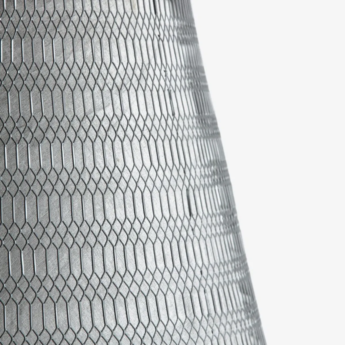 Close-up of the grey mesh pattern on the lamp shade