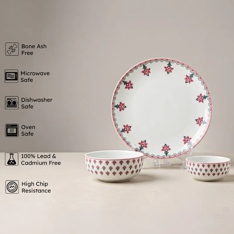Pink and white patterned plate with two matching bowls