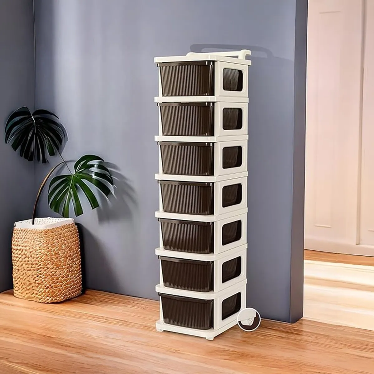 Tall white and brown drawer rack with wheels in a modern hallway