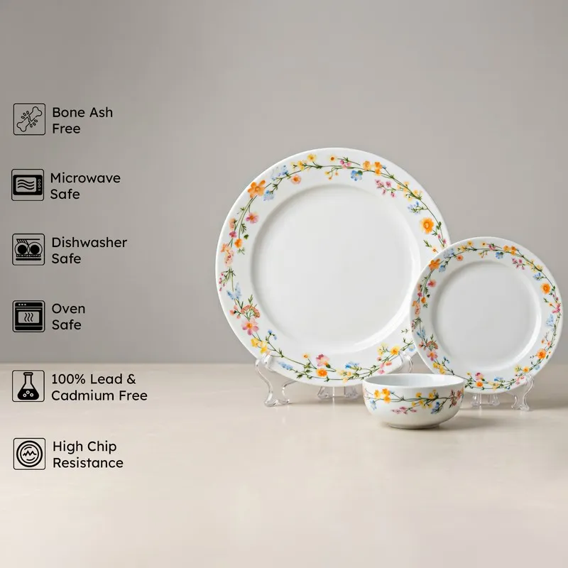 Three floral porcelain pieces displayed together on clear stands